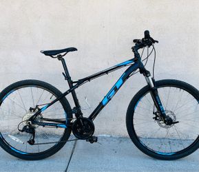 GT aggressor pro mountain Bike, Aluminum 6061 frame size medium , Double walls Rims size 27.5”, fit riders 5’8”to 6’3”