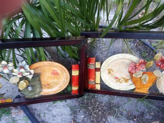 Nice colorful 2 metal decor hangings,  good condition.  Could be used inside or out