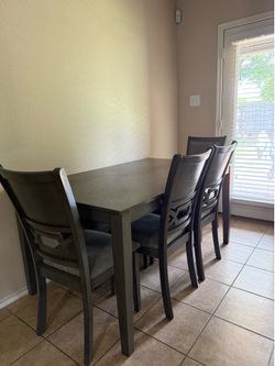 Dining table with 4 chairs and a bench