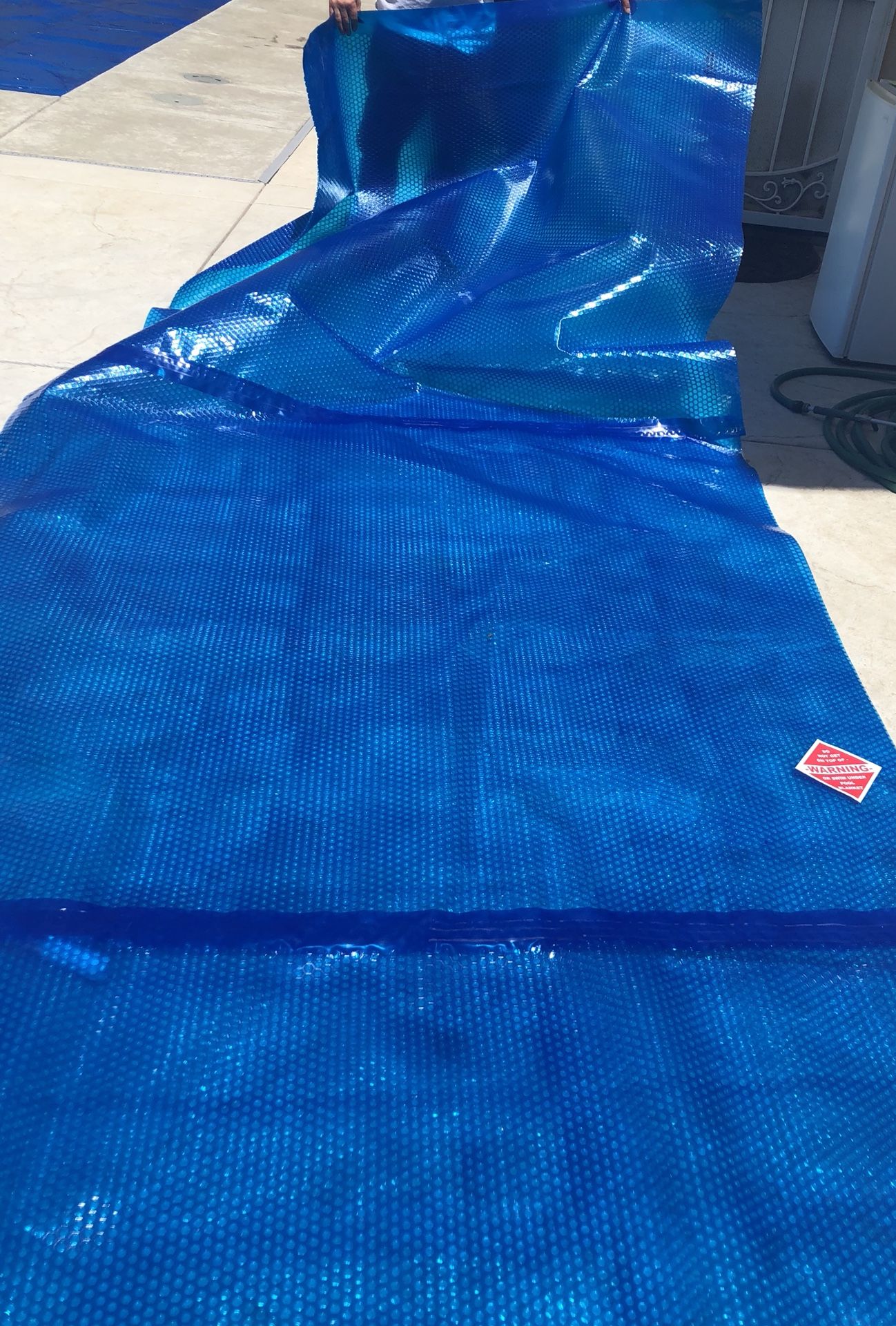 Leslie’s pool cover 15mil solar heating cover