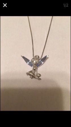 Silver Tinkerbell and chain. Crystal wings. Brand new. Never worn.