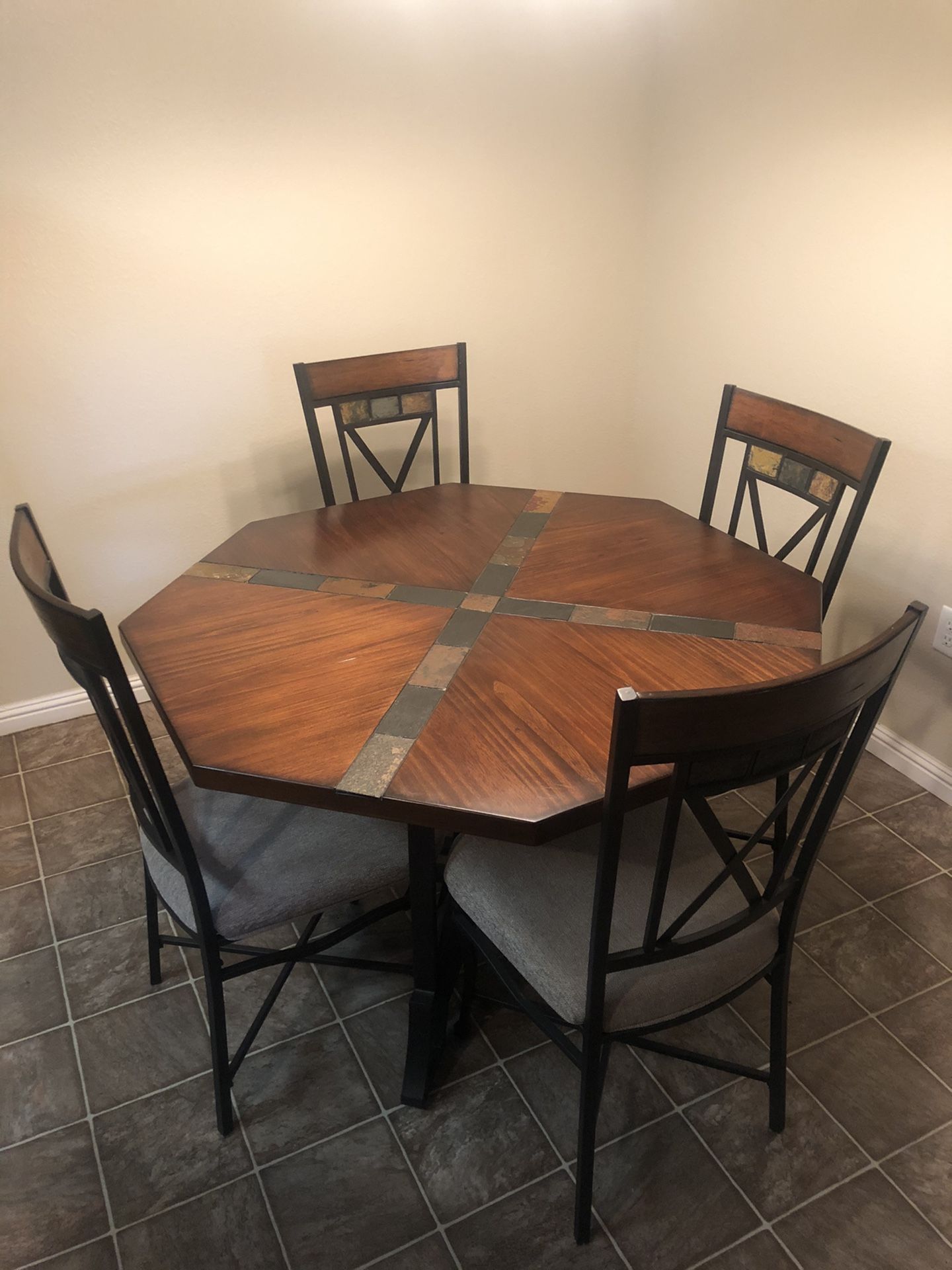 Like new Dining area table with 4 Chairs. Never used.