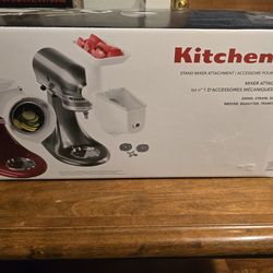 Kitchenaid attachment.
Grind-  slice - shred