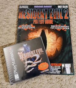 Resident Evil 2 for PS1, Dual Shock,  Pristine condition, with Perfect Guide Walk-through book. CIB