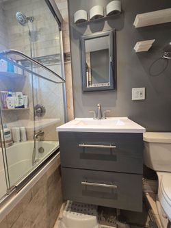 Bathroom vanity, sink, faucet, medicine cabinet and vanity light