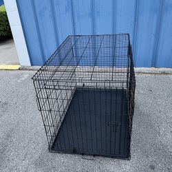 Dog Kennel -( size: 28”x 32”x 30” in high, comes with side door )- Used 