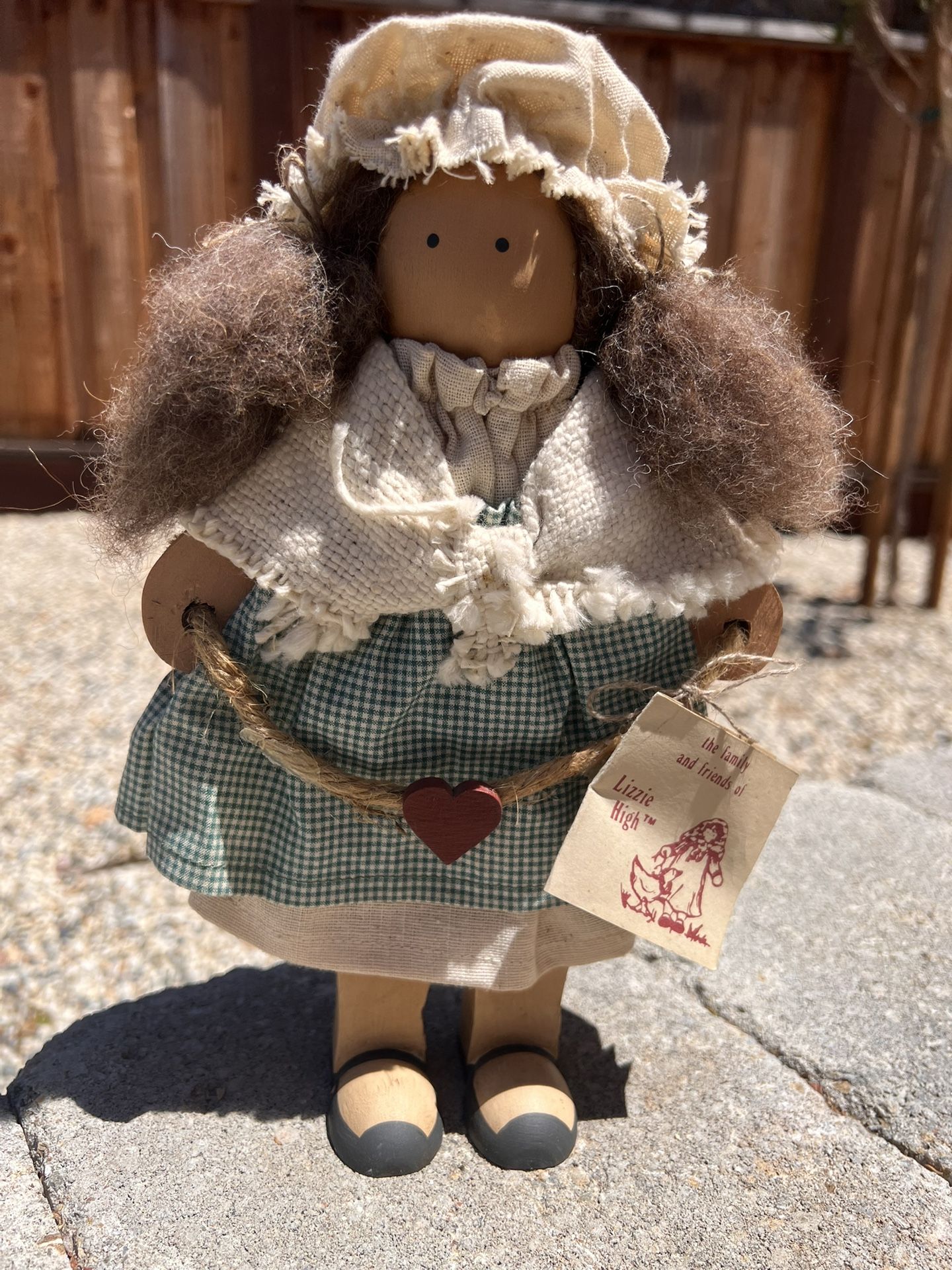 Lizzie High Doll Rachel Bowman Wood Folk Art  doll holding Christmas  garland 1986