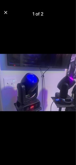 Dj   2 head moving lights.