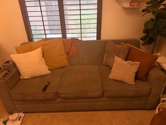 Gray living spaces queen pullout bed couch