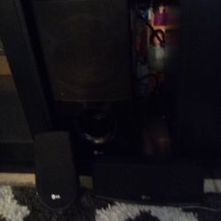 Lg Subwoofer And 2 LG Surround Sound Speakers 