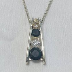 Vintage RMN pendant necklace silver tone black white crystals Roman and Sunstone
