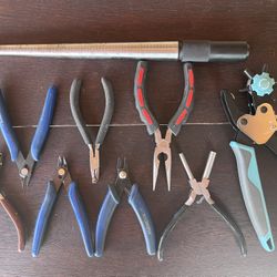 Jeweler tools and a leather punch