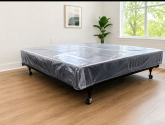 Moving Sale king size bed frame with wheels and box spring  like new