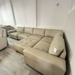 Teagan Leather Modular Sectional With Ottoman! Delivery And Financing Available!