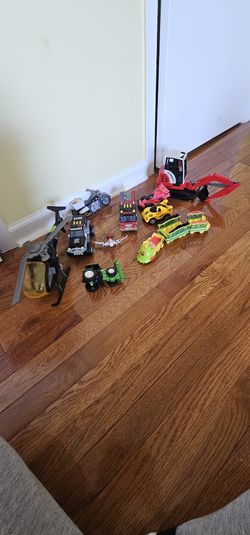 10 Vehicles: 3 Tonka, 2 Race,1 Train,1 Helicopter,1 Airplane,1tracktor,1 Excavator