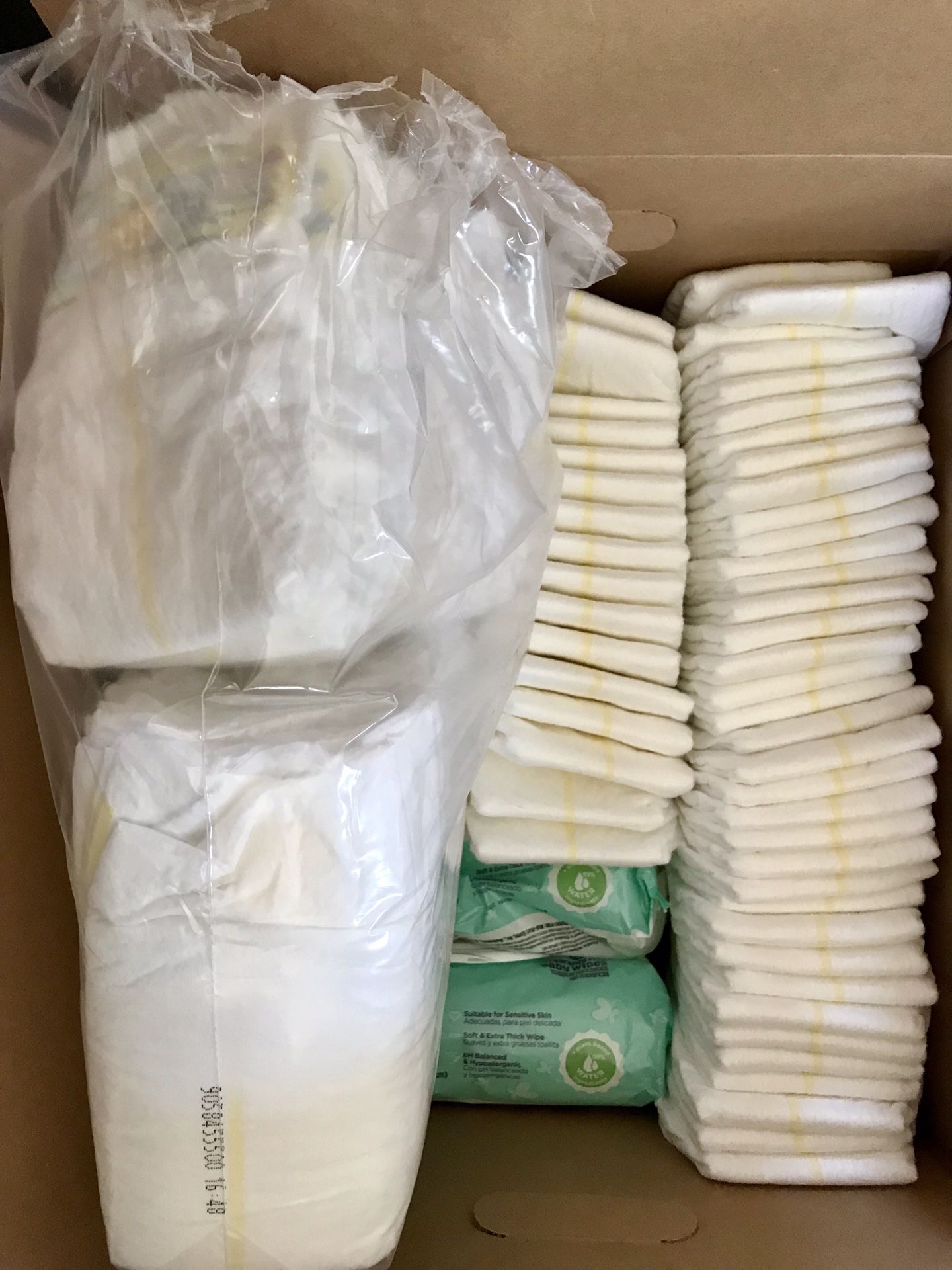 Pampers size 1 disposable diapers and wipes
