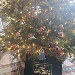 Disney glass year ornaments