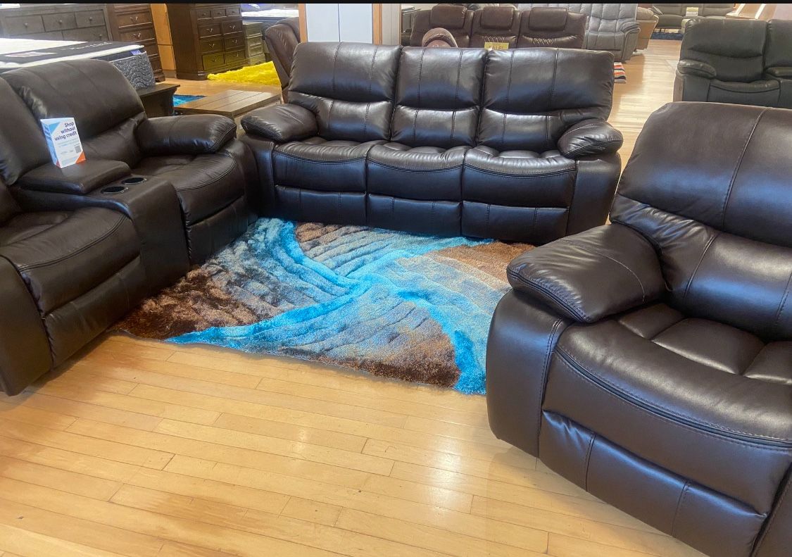 Going out of business sale. Madrid brown leather reclining sofa and loveseat $1099. Recliner chair, $399. Easy finance. Same-day delivery.