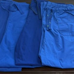 Womens scrub uniforms 8 piece lot of bottoms size medium/large (have a lot for tops as well) 