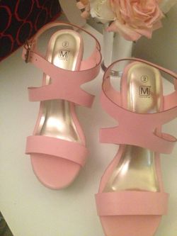 Pink shoes.