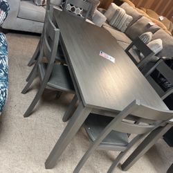 Brand new table and six chairs for 599