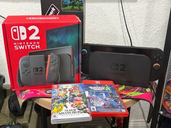 NINTENDO SWITCH 2 W 2 games and extra control