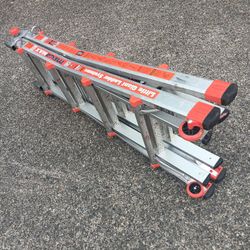 Little Giant 17foot Folding Ladder Excellent Condition( Has Older Cast Sliding Looks) For Pick Up Fremont Seattle. No Low Ball Offers Please. No Trade