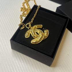 Gold  necklace with box and bag