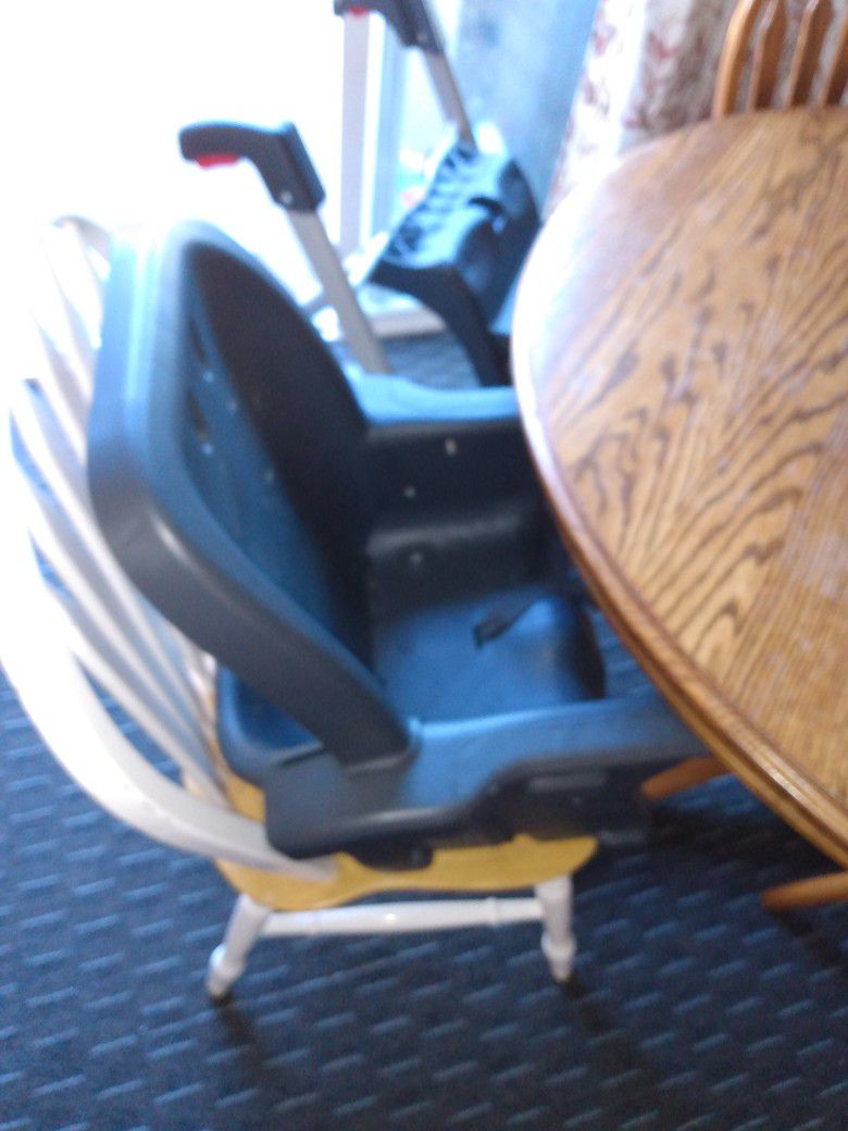 High Chair with different functions. In Very Good Condition 