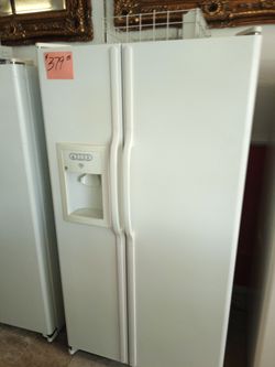 GE Side by Side Refrigerator White ex large . Warranty . Delivery available . 2203 Fowler st. Ft. Myers 33901