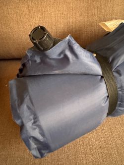 Self inflating camping sleeping pad