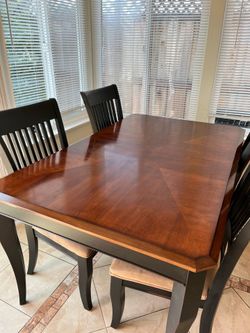 Wooden dining table with 4 chairs
