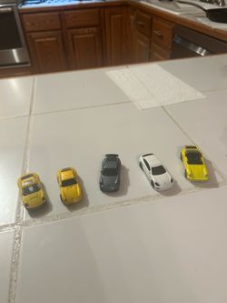 5 Porsches toy cars