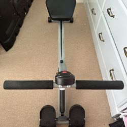 Sunny Health & Fitness Compact Adjustable Rowing Machine with 12 Levels of Complete Body Workout 