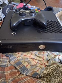 Xbox 360 slim with one controller. No power supply
