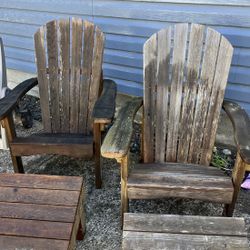 Two Wood Adirondack Chairs With Ottomans