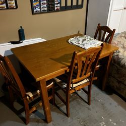 Dining table with three Chairs 