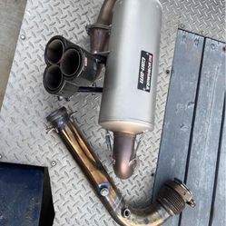 Yoshimora exhaust for can am x3 with spark arrestor and mounting brackets. 