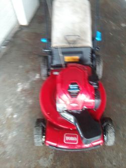 Toro vortex lawn mower w shelf propelled w bag like new