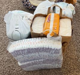 Size 1 diapers various brands (cuties, pampers, Huggies, luvs)