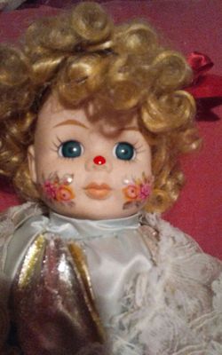 Vintage porcelain clown music doll