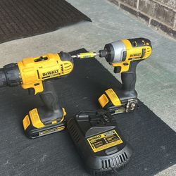 DEWALT DRILL CHARGER AND TWO BATTERY $150 SERIOUS BUYERS PLEASE