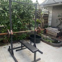 Squat Rack With Bar And Weight. 