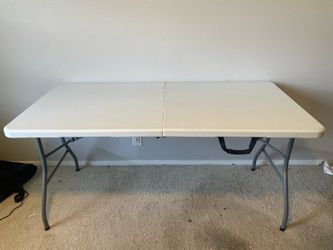 Folding table 62in.