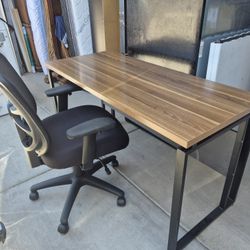 Desk and Chair In Very Good Condition// 55" Length X 24" Depth and 30" Height 