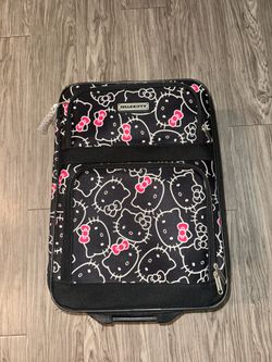Hello Kitty luggage.  Comes w tote / cosmetics bag