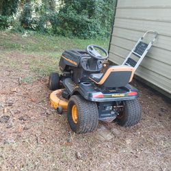 Poland Riding Mower $300and Push   Mower  Needs Tuningup