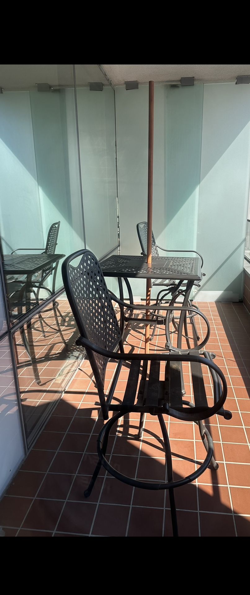 2 High Top Chairs With Table And Umbrella Pole