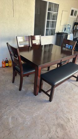 Dining table and 4 Chairs one bench