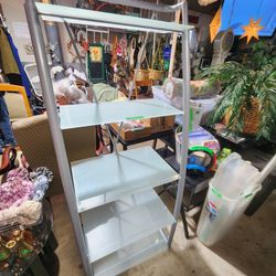 5 tier bookshelf 
Frosted glass shelves with silver frame
